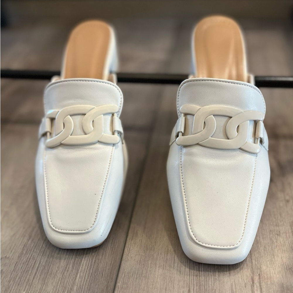 White slipped on shoes